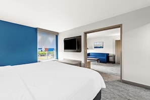 Suite, 1 King Bed (Bath Walk-In Shower) | In-room safe, desk, iron/ironing board, free cots/infant beds