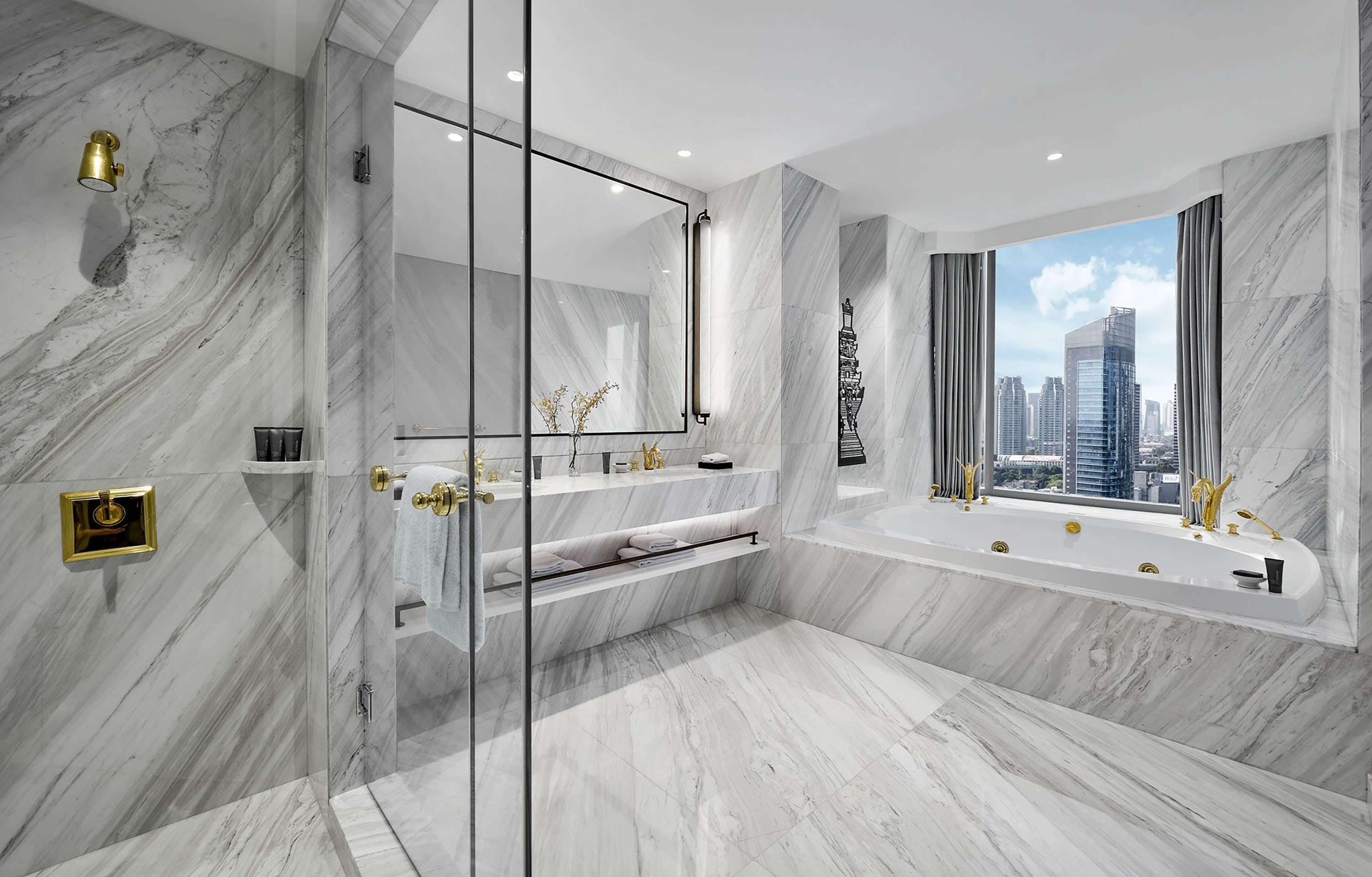 separate bathtub and shower, free toiletries, hair dryer, bathrobes