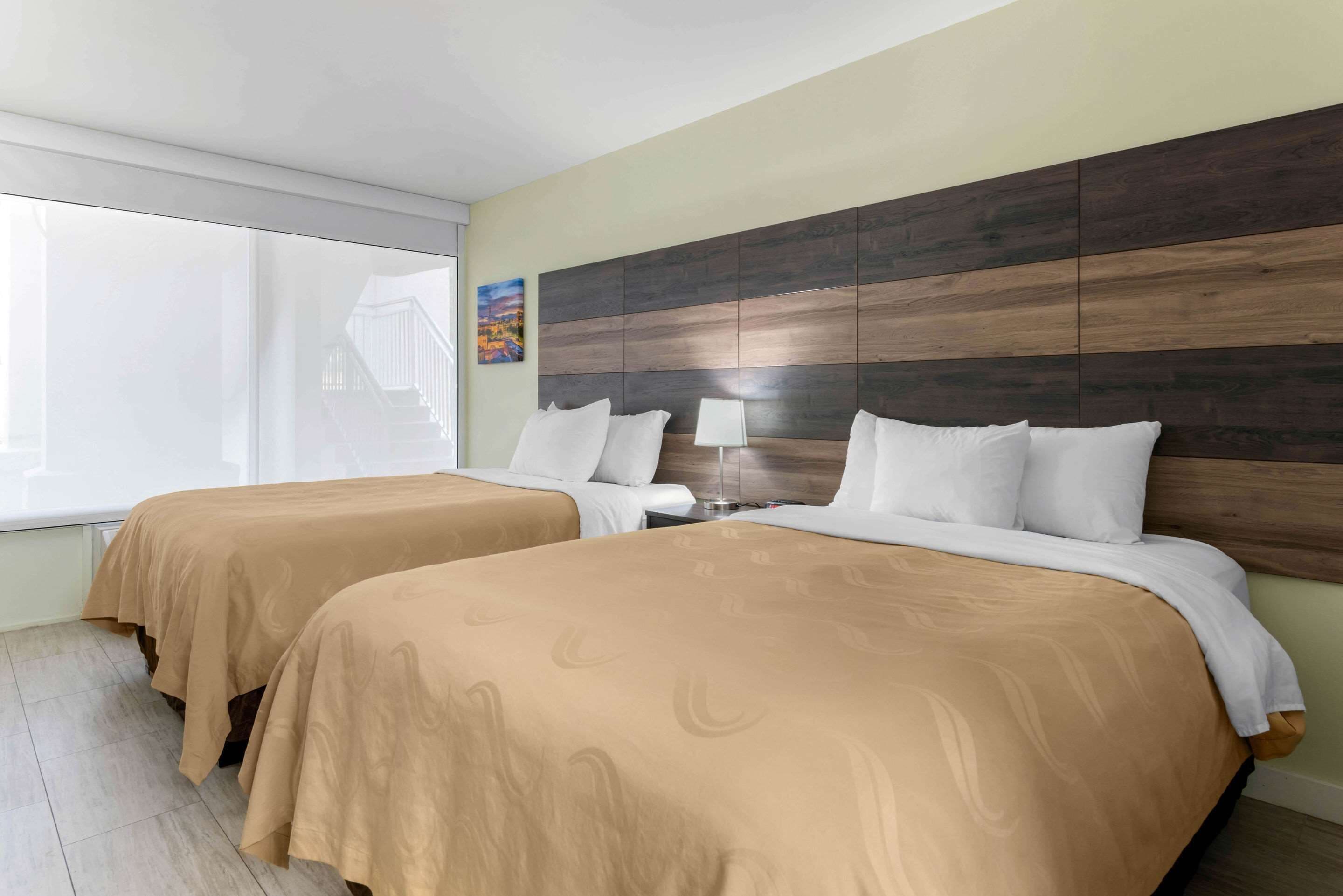 Premium bedding, desk, blackout drapes, iron/ironing board