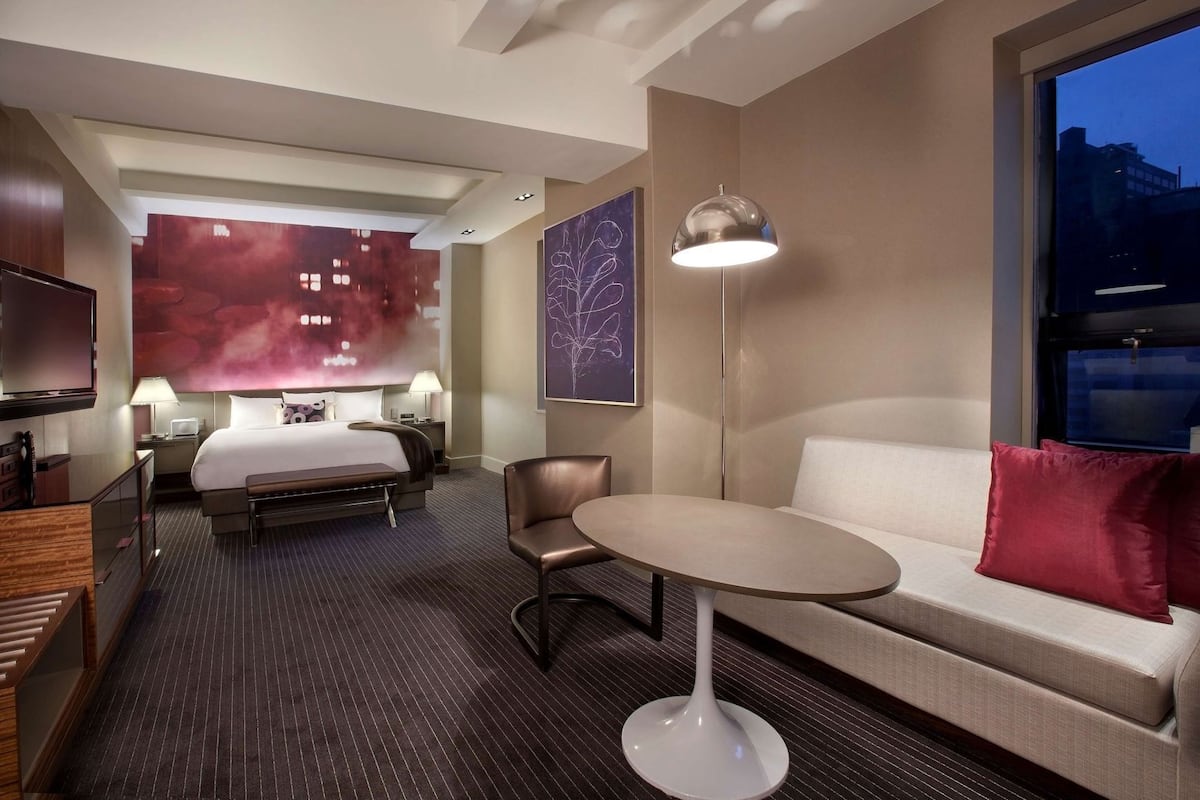 Premium bedding, pillow-top beds, minibar, in-room safe