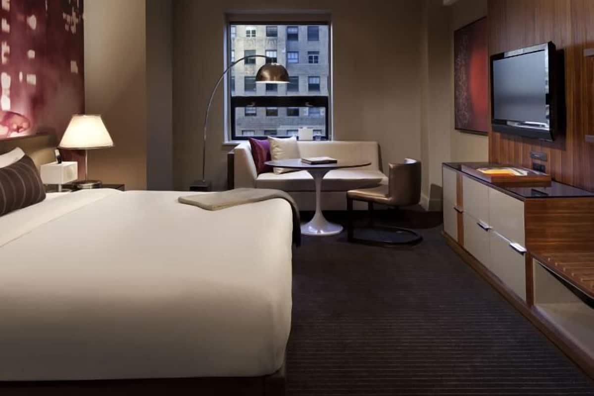 Premium bedding, pillow-top beds, minibar, in-room safe