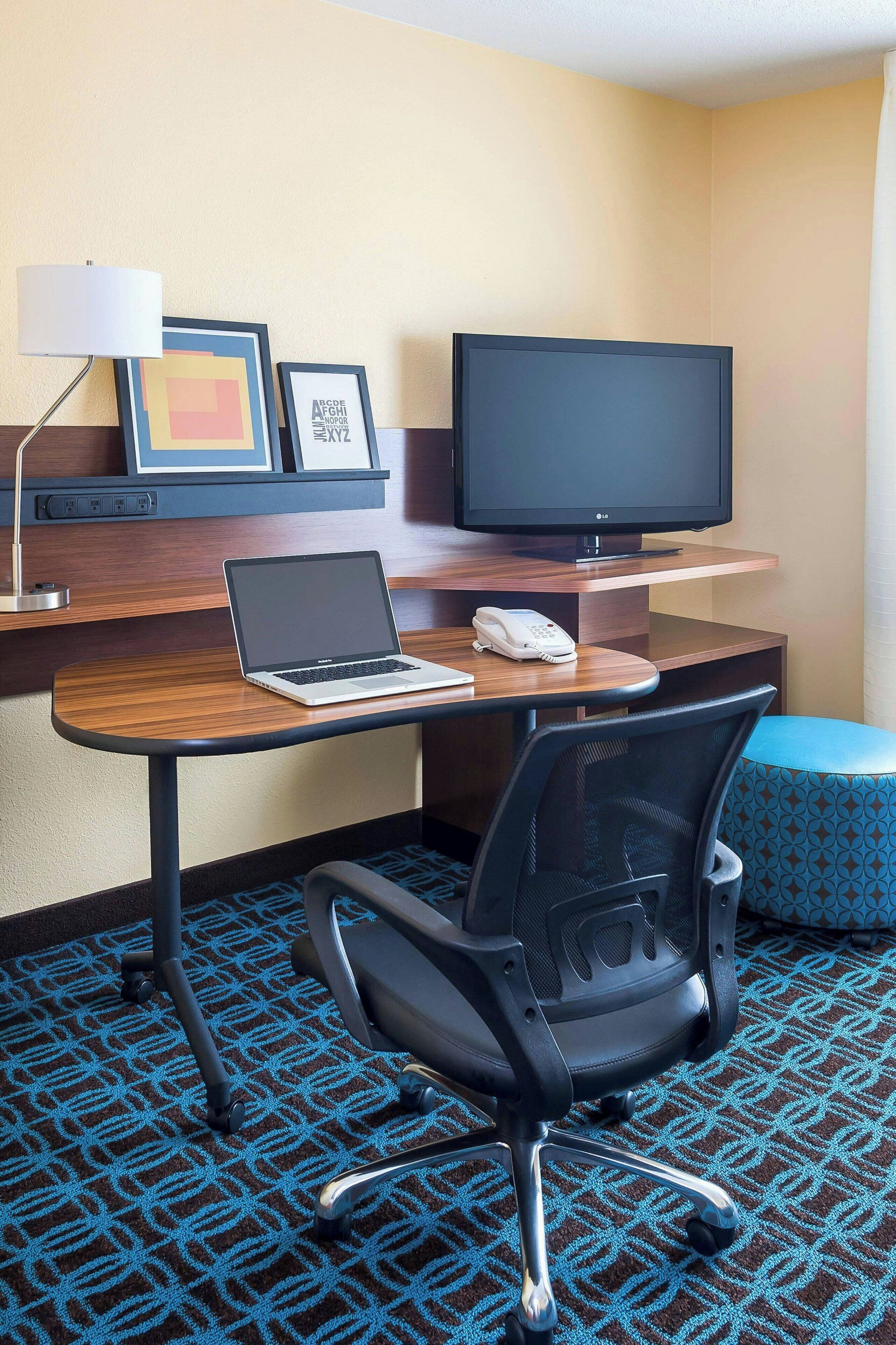 hypo-allergenic bedding, desk, blackout curtains, iron/ironing board