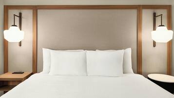 Hypo-allergenic bedding, desk, blackout drapes, iron/ironing board