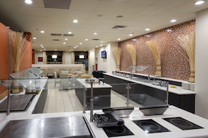 Daily buffet breakfast (USD 15.00 per person)
