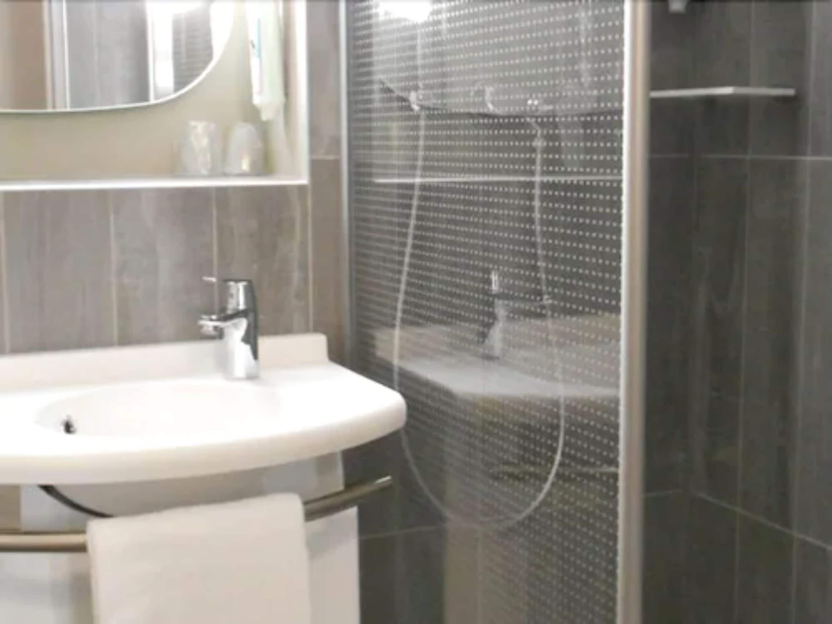 eco-friendly toiletries, hair dryer, towels