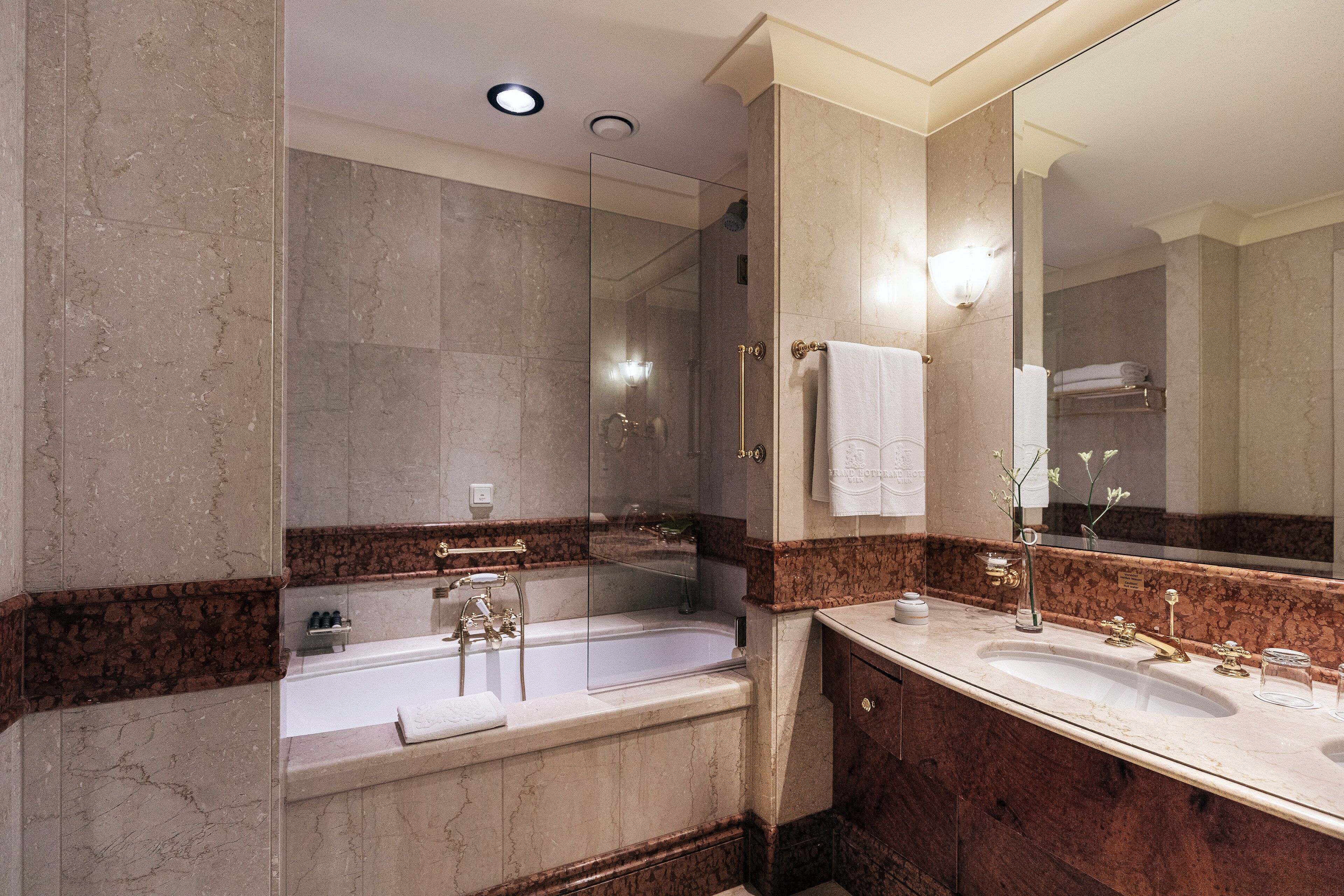 combined shower/bathtub, free toiletries, hair dryer, bathrobes