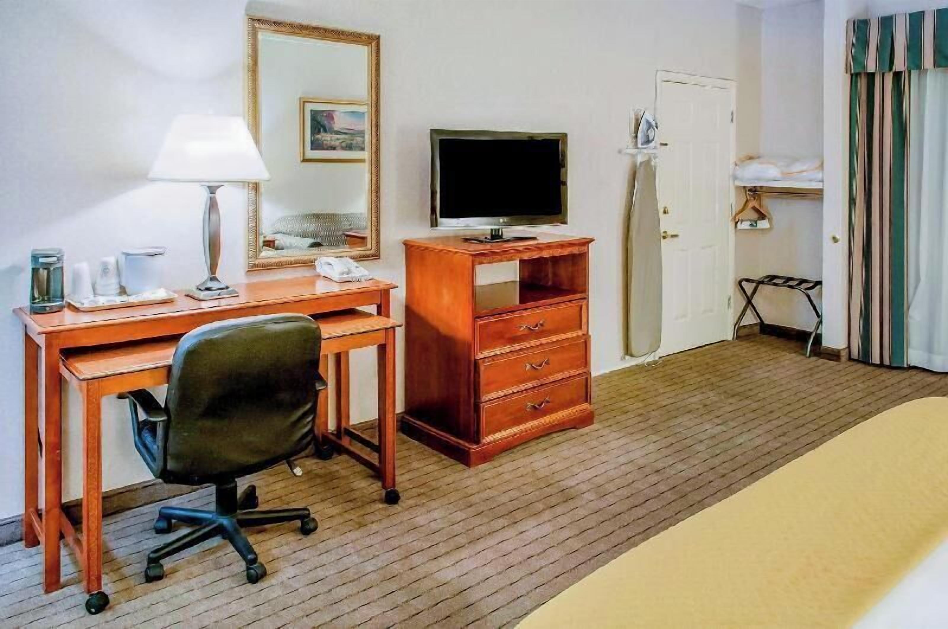 Desk, laptop workspace, blackout curtains, iron/ironing board