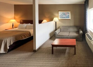 Suite, 1 King Bed with Sofa bed, Non Smoking | Desk, laptop workspace, blackout curtains, iron/ironing board