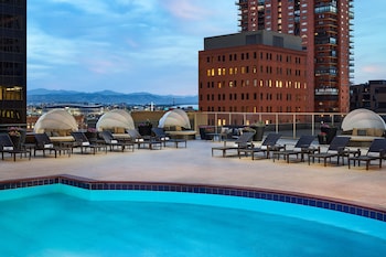 Indoor pool, outdoor pool, open 5:00 AM to 10:00 PM, sun loungers at The Westin Denver Downtown