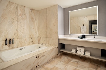 Luxury Suite, 1 King Bed, Non Smoking, Mountain View | Bathroom | Combined shower/tub, designer toiletries, hair dryer, bathrobes at The Westin Denver Downtown