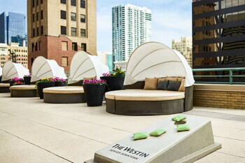 Indoor pool, outdoor pool, open 5:00 AM to 10:00 PM, sun loungers at The Westin Denver Downtown
