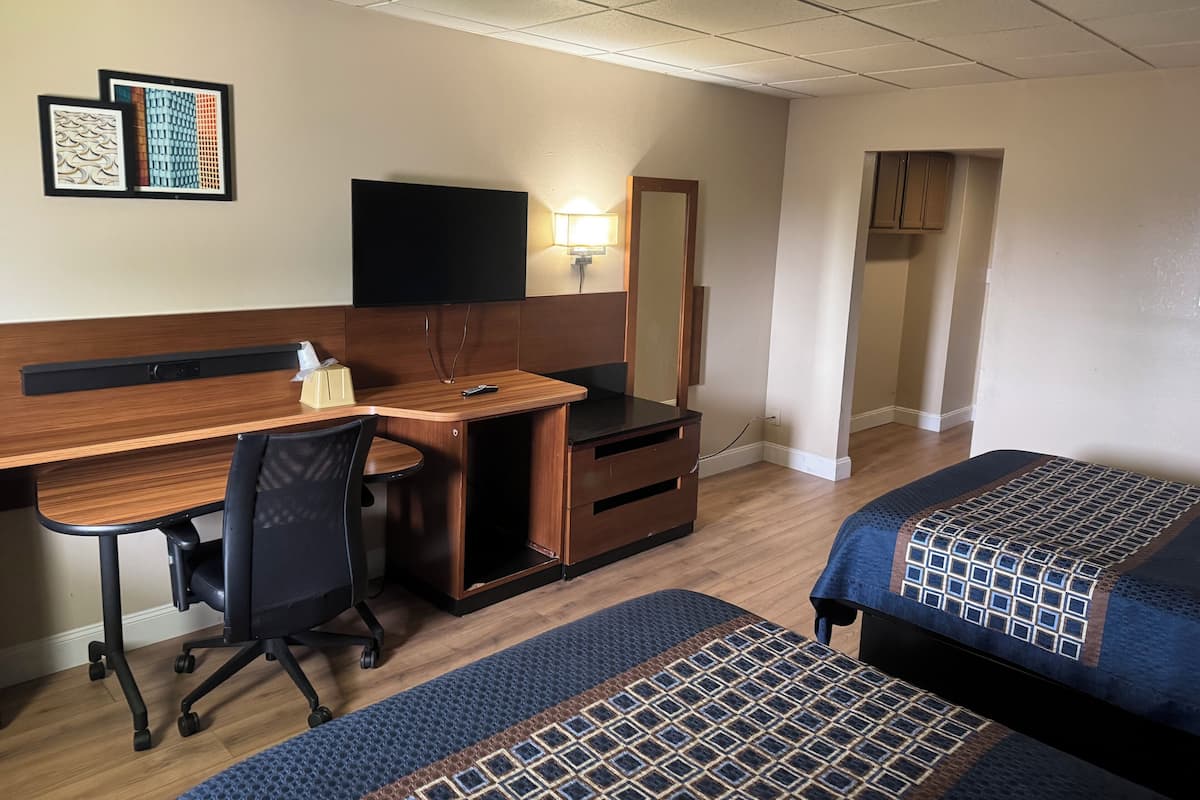 Desk, blackout drapes, WiFi (free), bed sheets