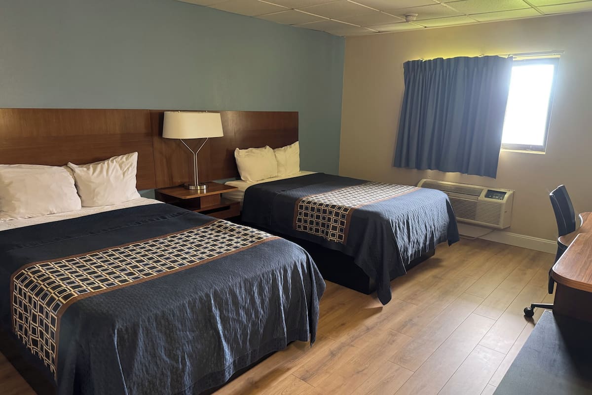 Desk, blackout drapes, WiFi (free), bed sheets