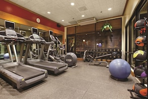 A gym with treadmills, exercise balls, and dumbbells. - DoubleTree by Hilton Durango (Durango)