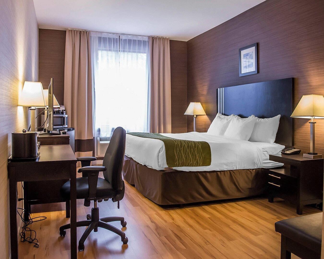 Pillow-top beds, desk, blackout curtains, iron/ironing board