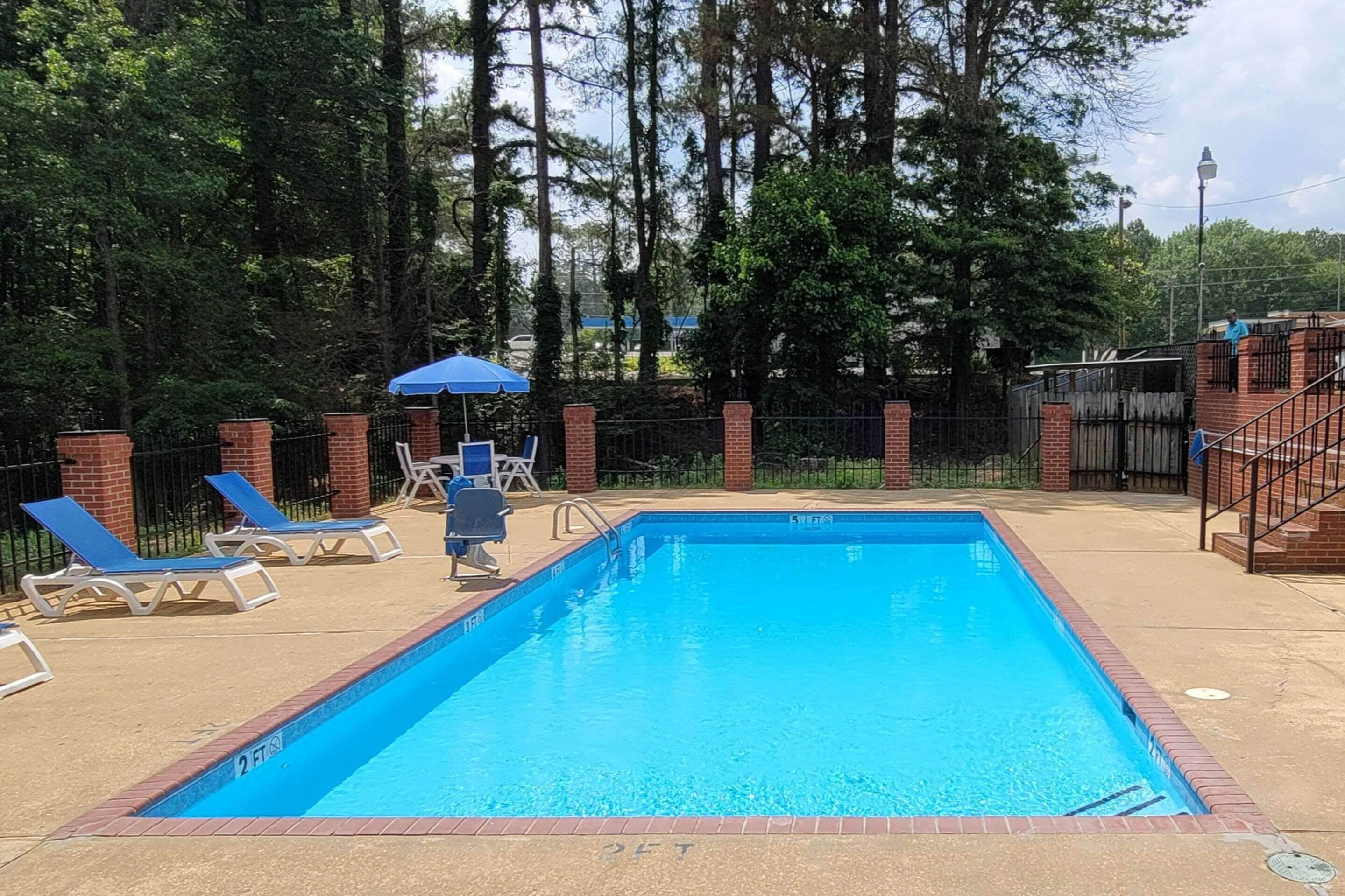 Seasonal outdoor pool, open 11:00 AM to 9:00 PM, sun loungers