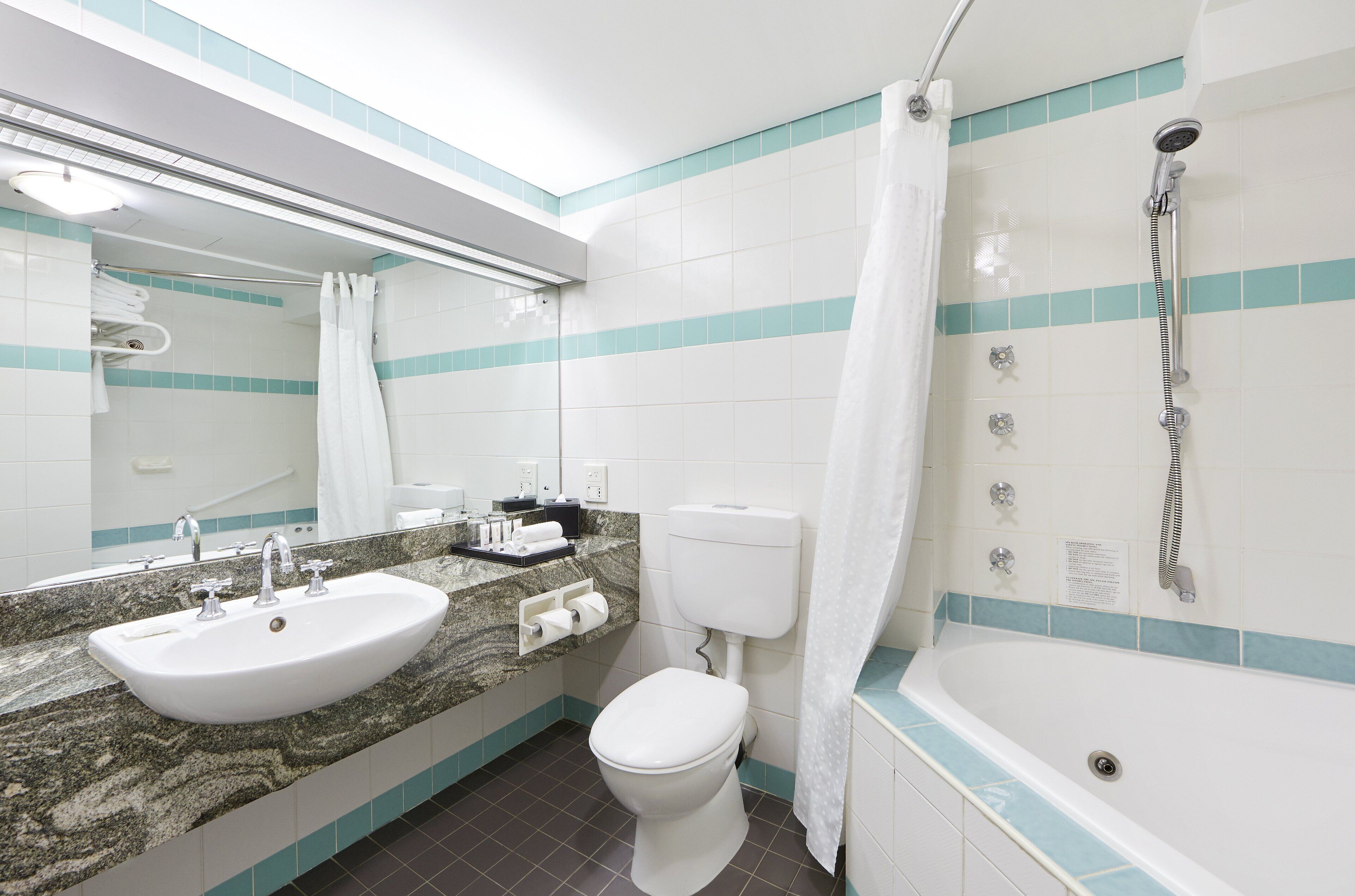 suite, 1 king bed | bathroom | free toiletries, hair dryer, towels, soap