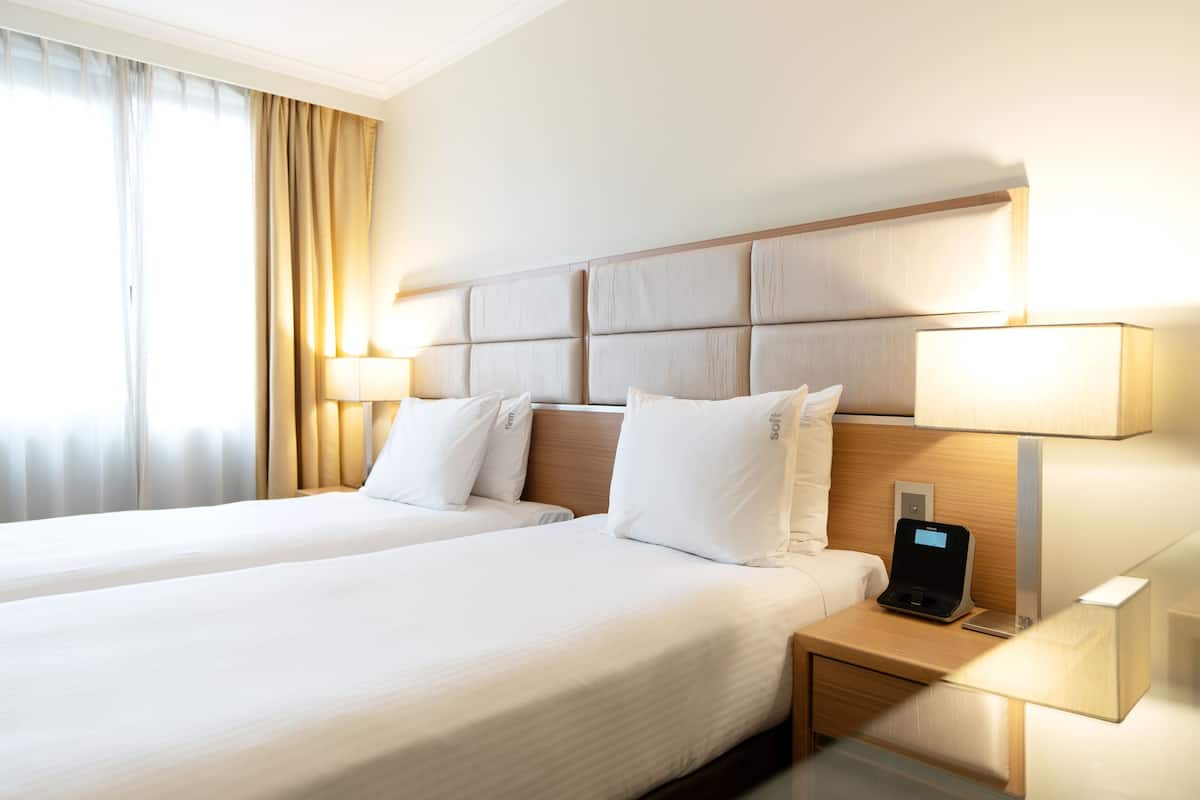 Premium bedding, pillow-top beds, in-room safe, desk