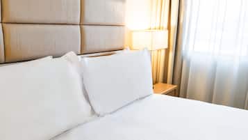 Premium bedding, pillow-top beds, in-room safe, desk