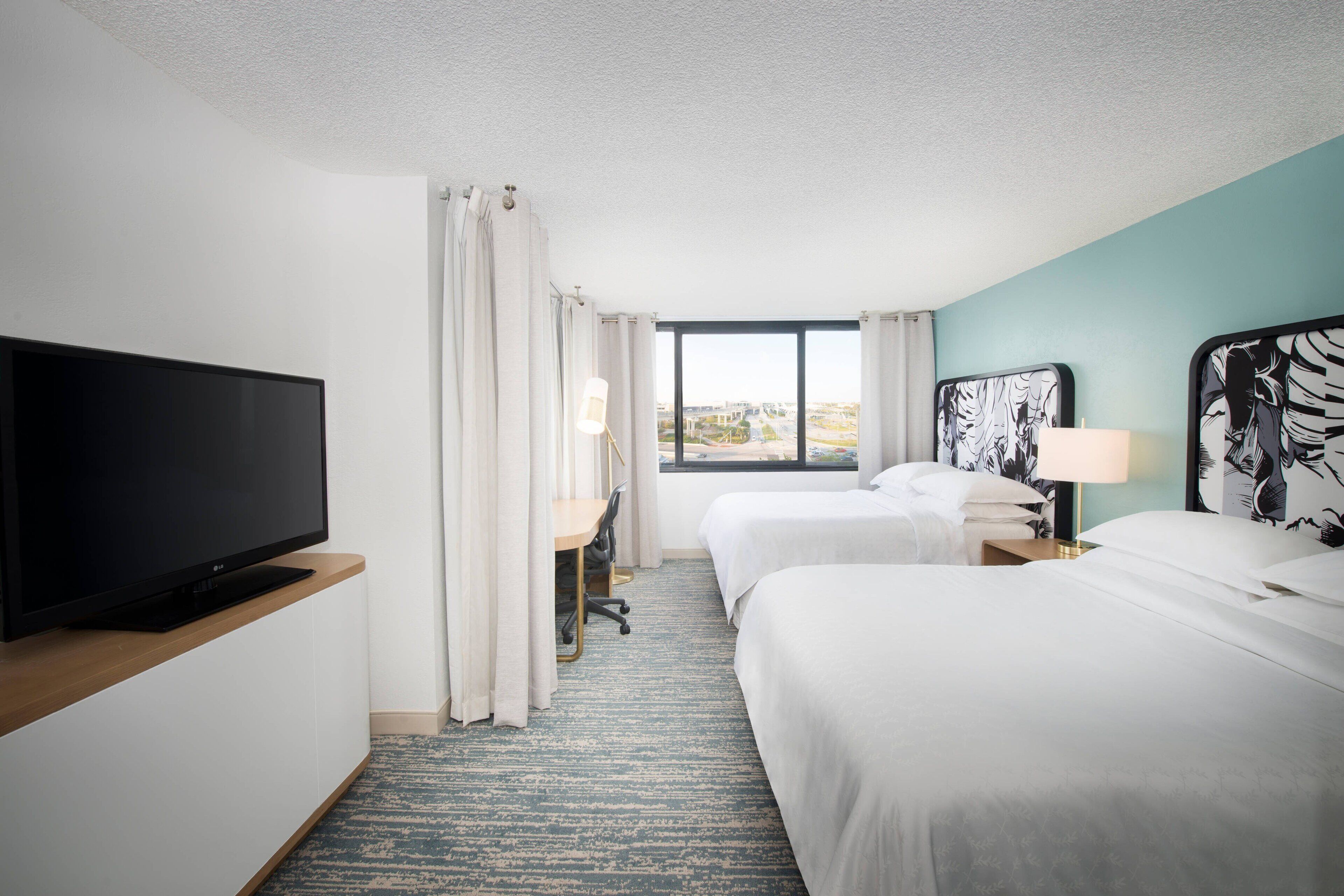 Premium bedding, down comforters, pillowtop beds, in-room safe