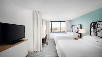 Premium bedding, down comforters, pillowtop beds, in-room safe