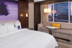 Premium bedding, down comforters, in-room safe, desk