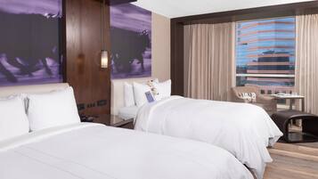 Premium bedding, down comforters, in-room safe, desk