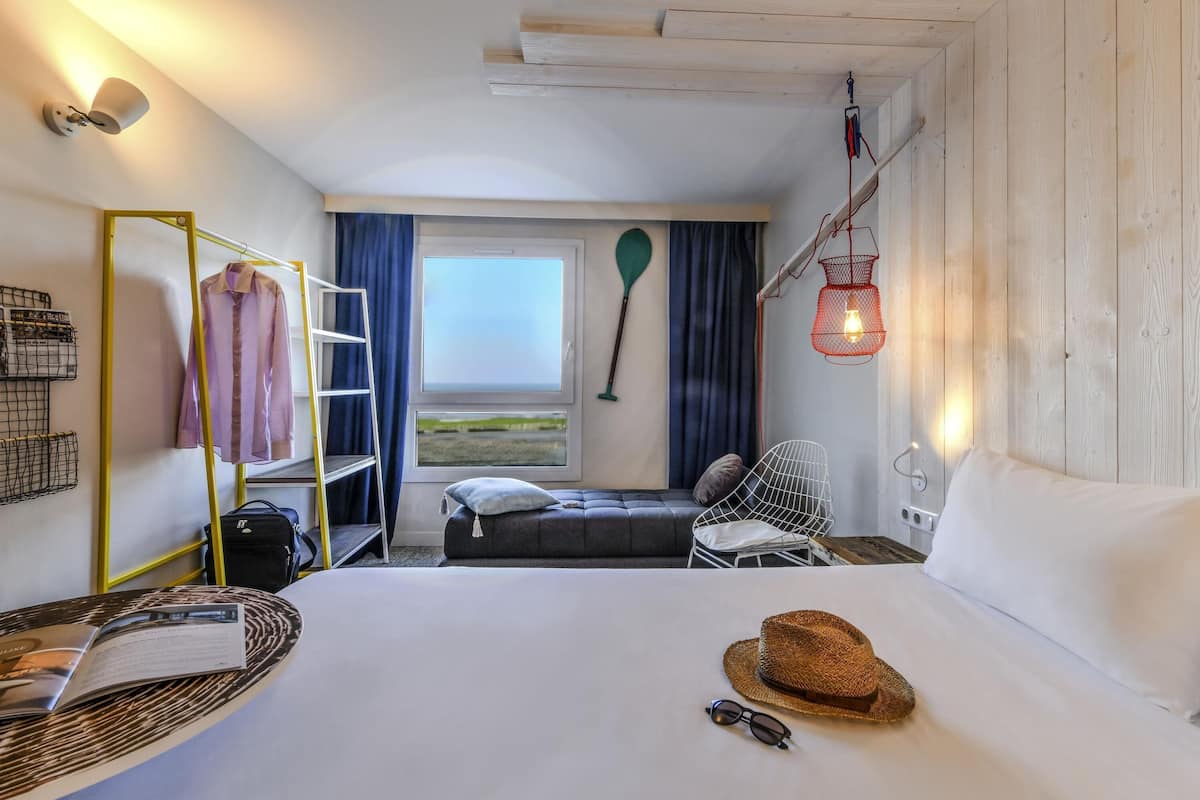 room, multiple beds, ocean view | desk, blackout curtains, soundproofing, iron/ironing board