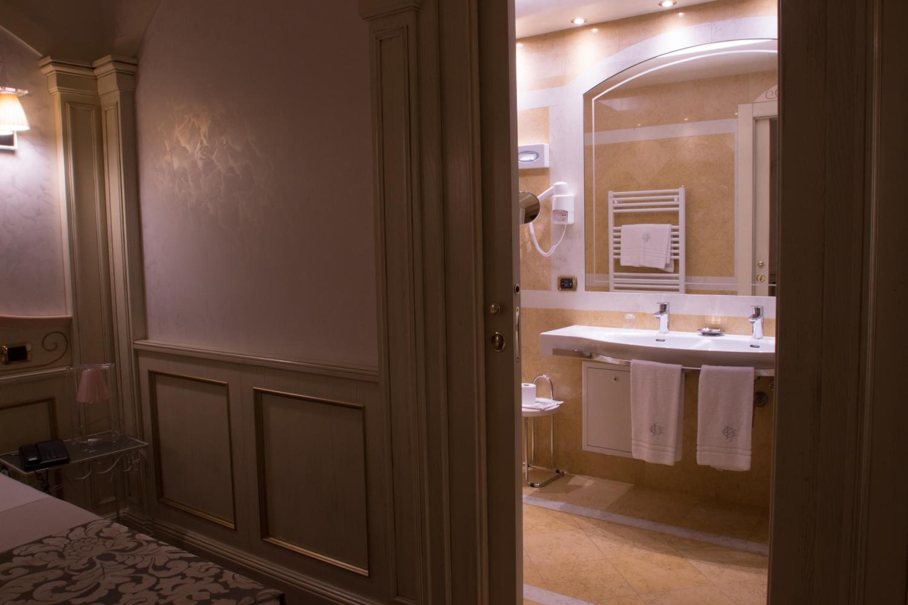 superior double or twin room | bathroom | bathtub, free toiletries, hair dryer, slippers
