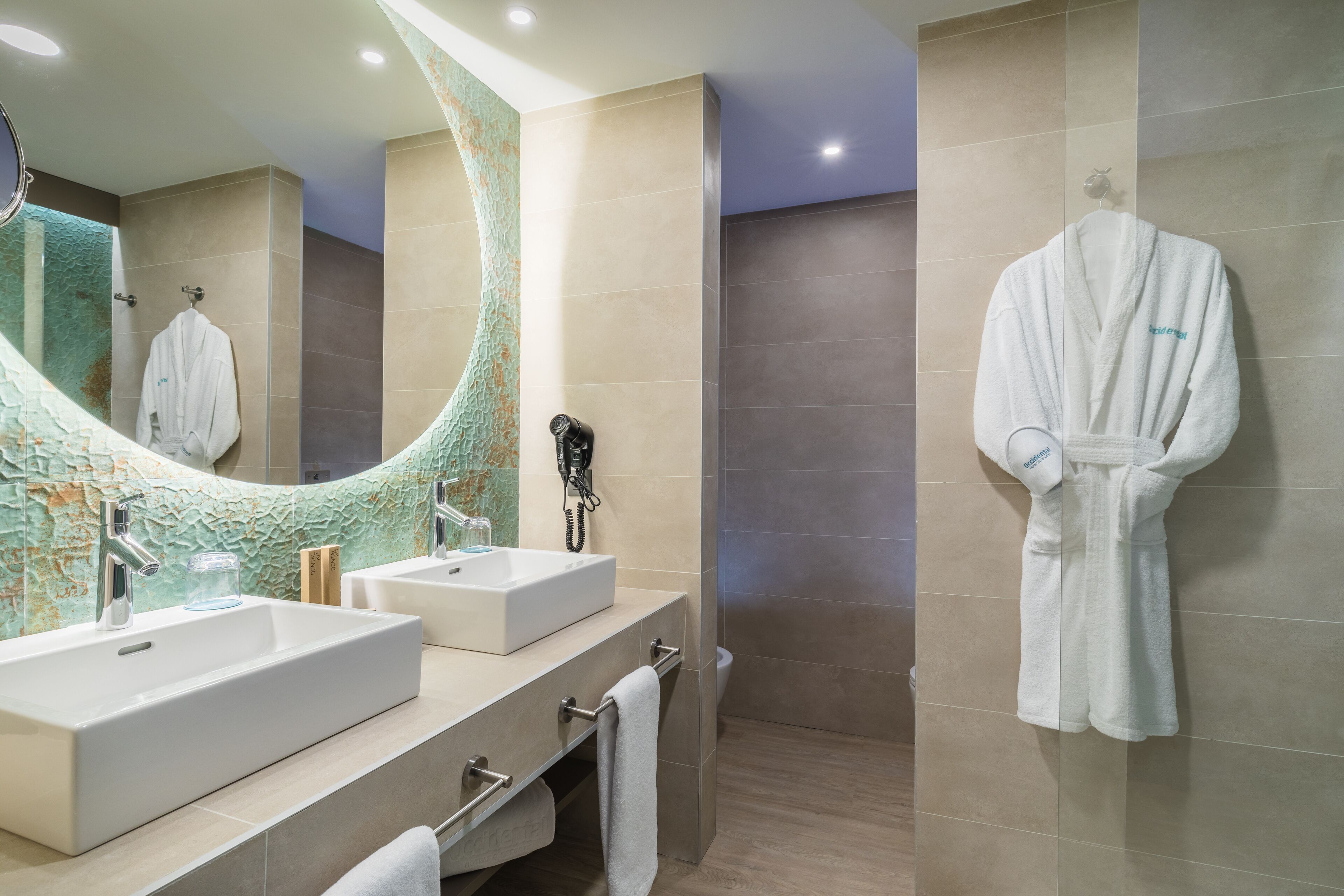 shower, hair dryer, bidet, towels