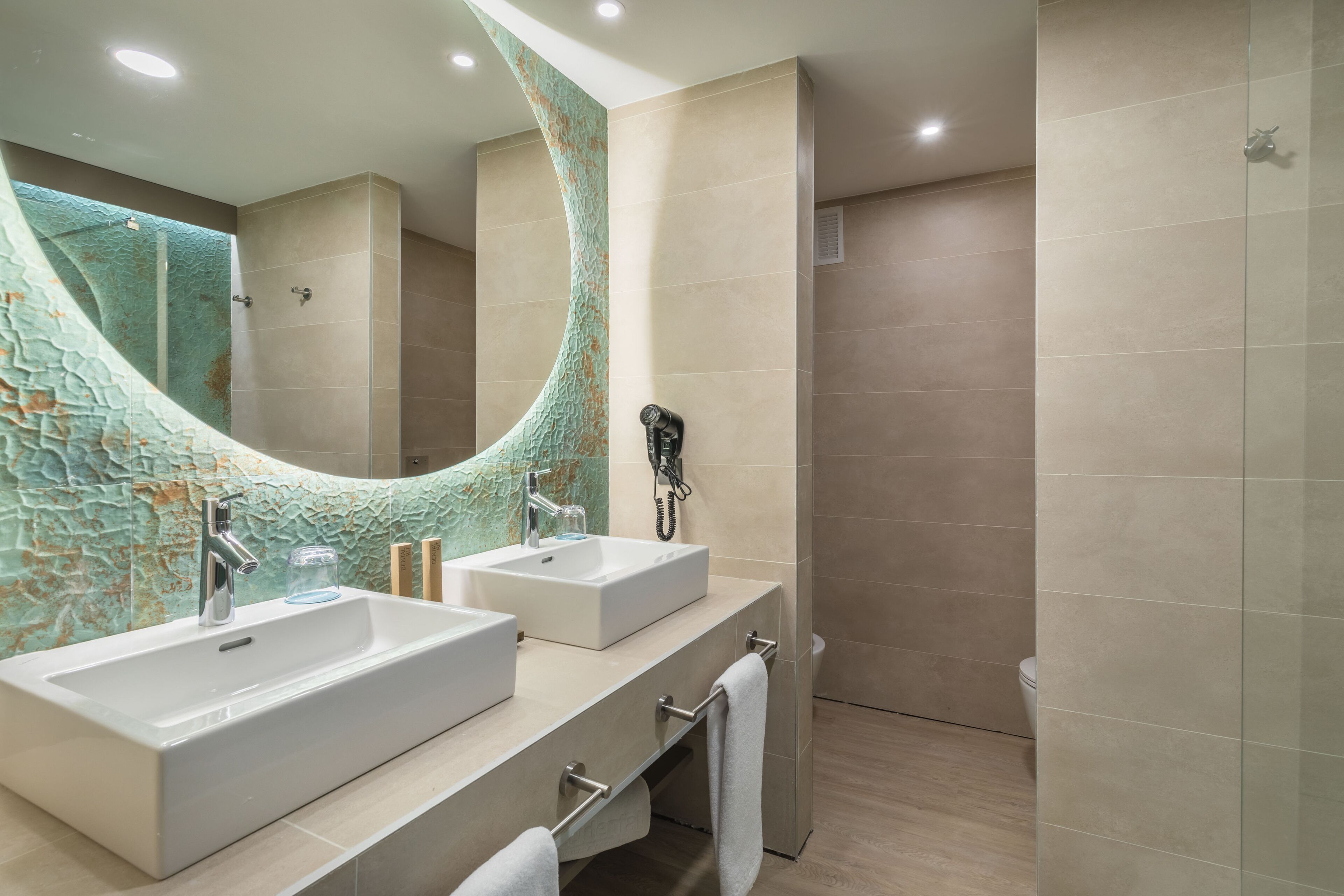 shower, hair dryer, bidet, towels