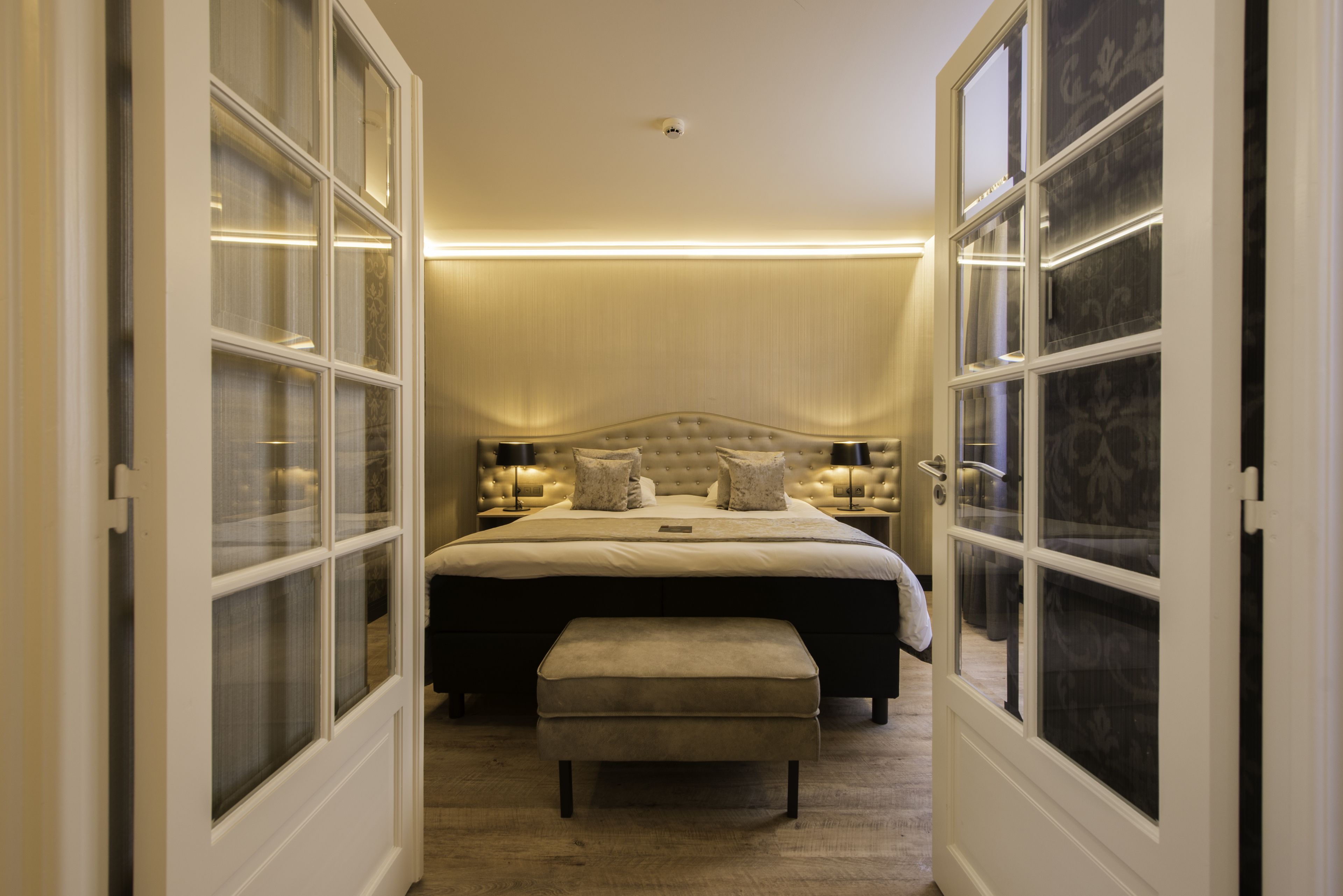 superior family room | minibar, in-room safe, desk, blackout curtains