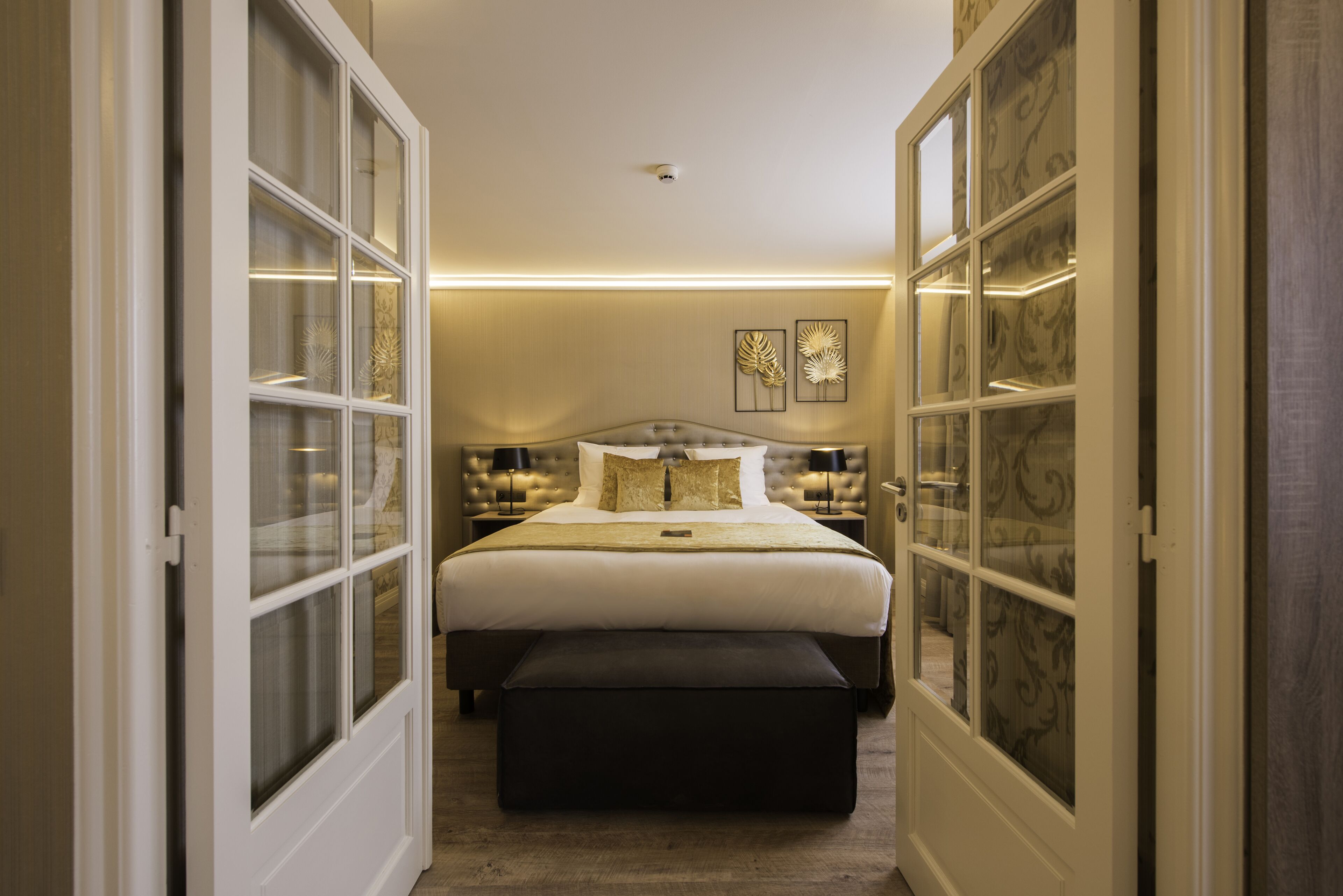 superior family room | minibar, in-room safe, desk, blackout curtains