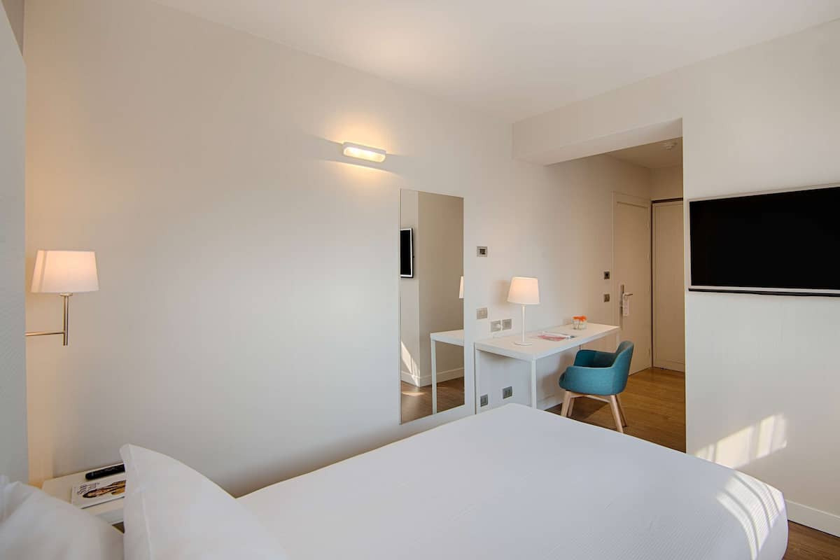 Down duvets, minibar, in-room safe, desk