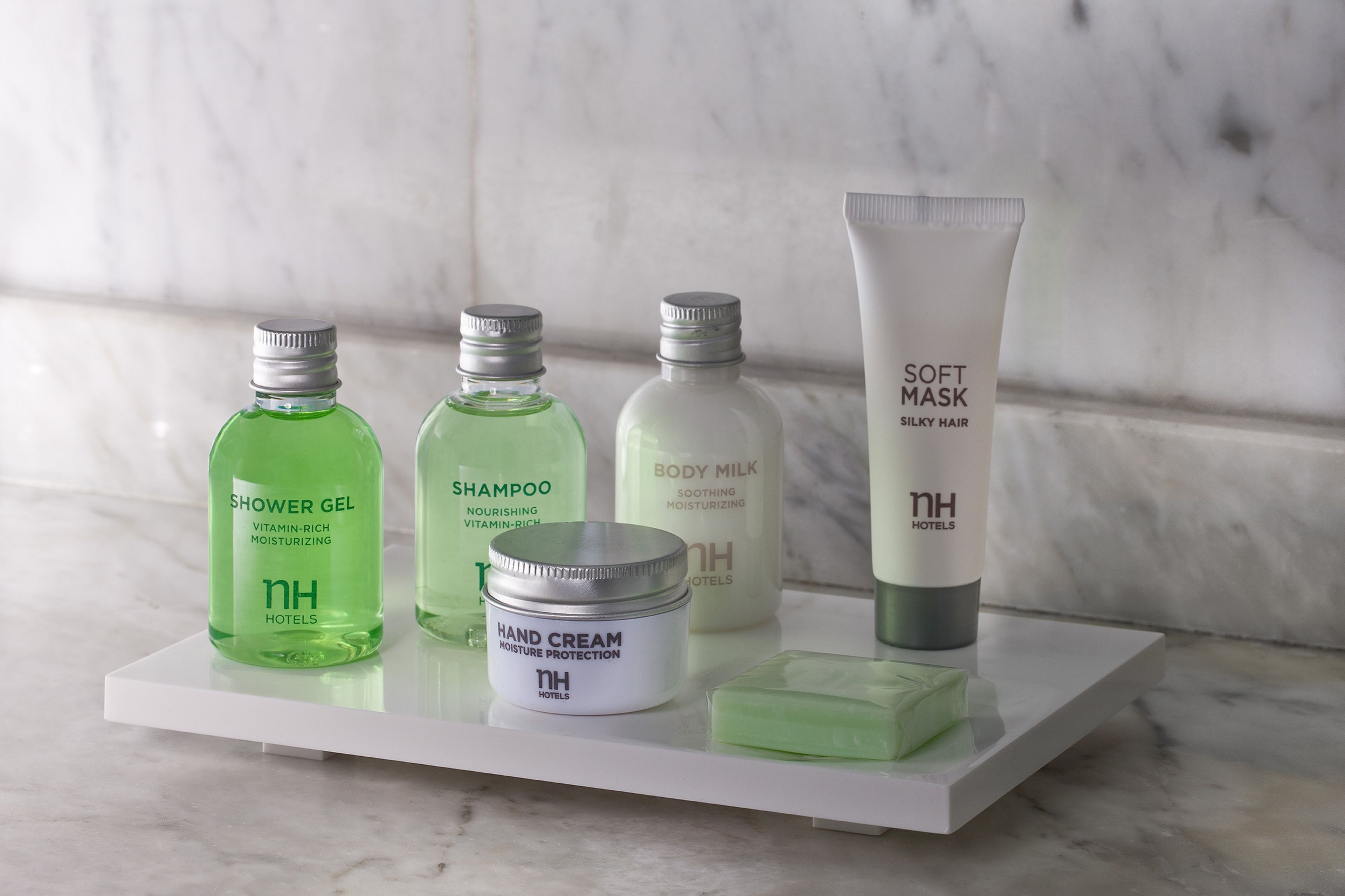 eco-friendly toiletries, hair dryer, slippers, bidet