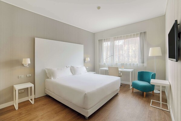 Dundyner, minibar, safe på rommet og skrivebord