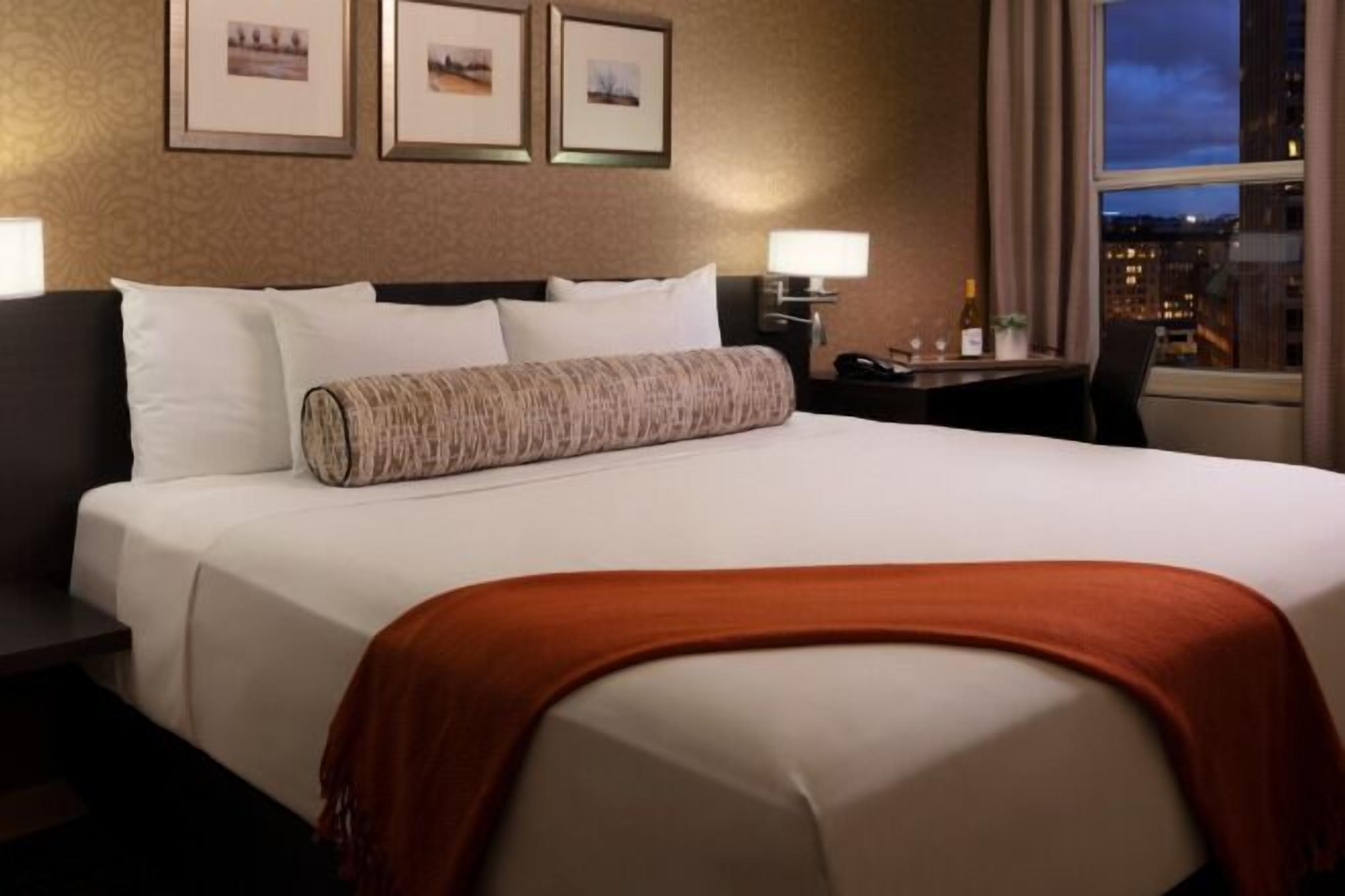 Premium bedding, in-room safe, blackout curtains, iron/ironing board