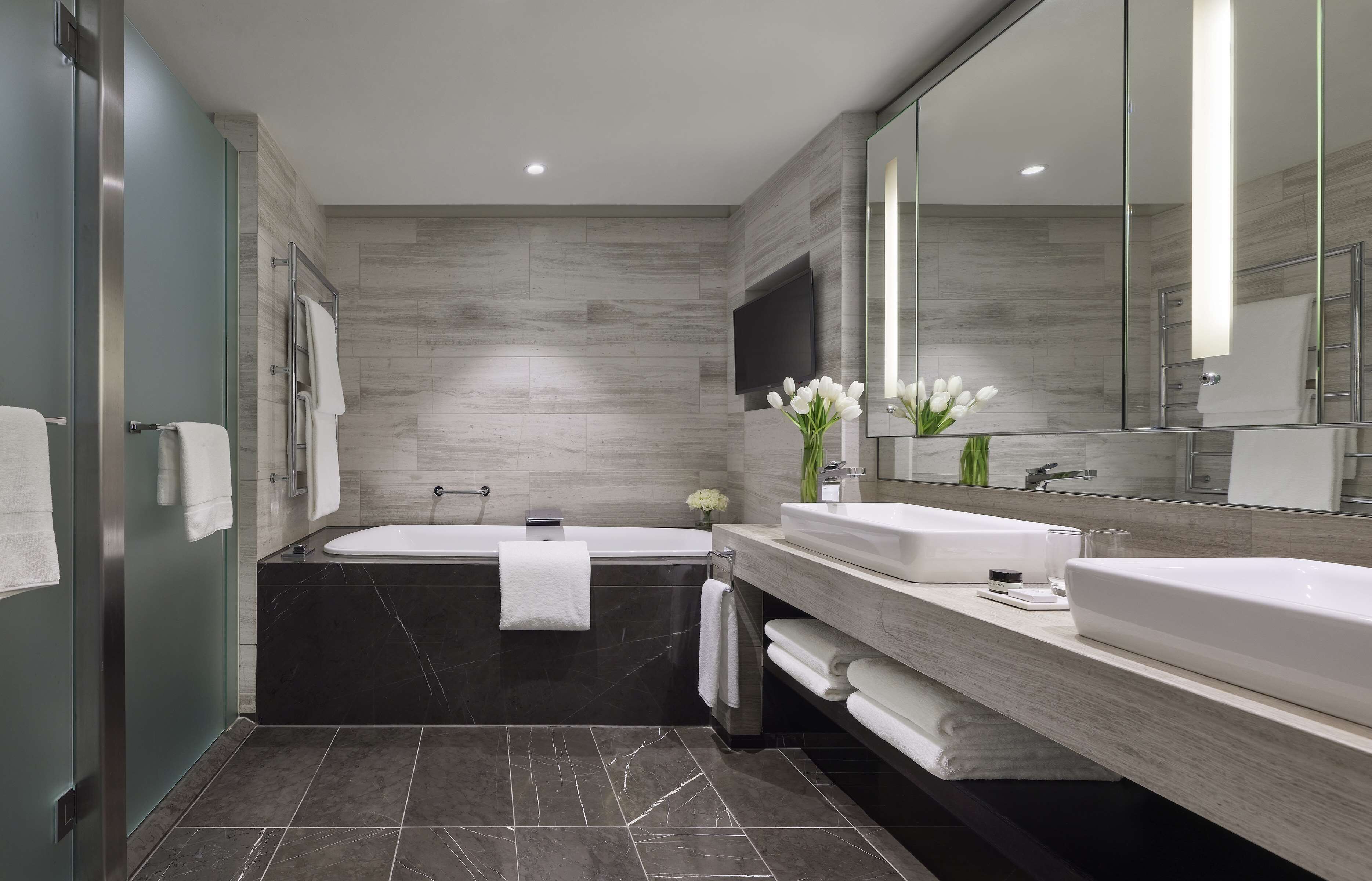 separate bathtub and shower, deep-soaking bathtub, hair dryer, bathrobes