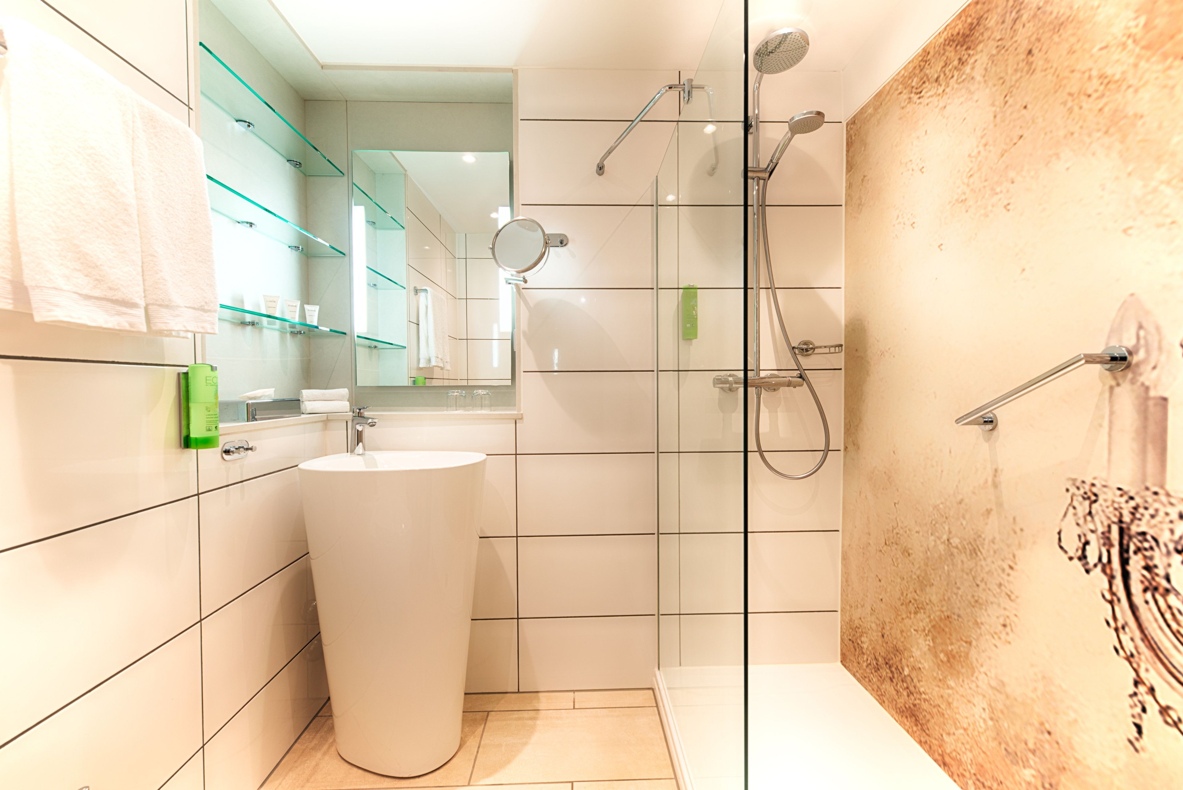 eco-friendly toiletries, hair dryer, towels, soap