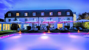 Indoor pool, outdoor pool, open 7:00 AM to 10:00 PM, pool loungers