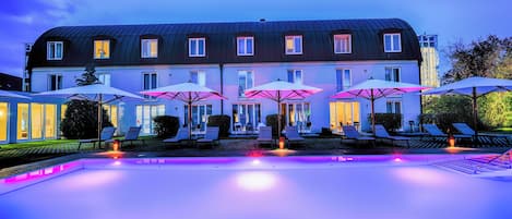 Indoor pool, outdoor pool, open 7:00 AM to 10:00 PM, pool loungers