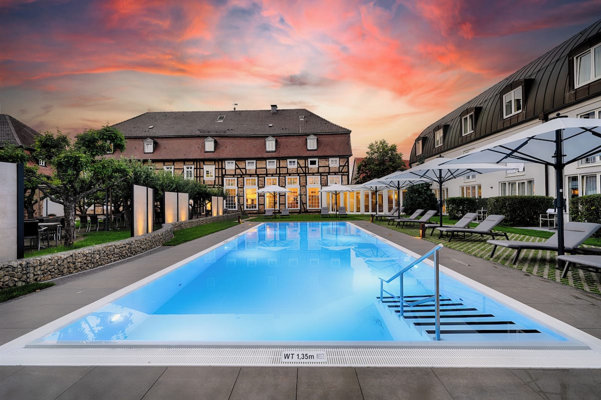 indoor pool, outdoor pool, open 7:00 am to 10:00 pm, pool loungers