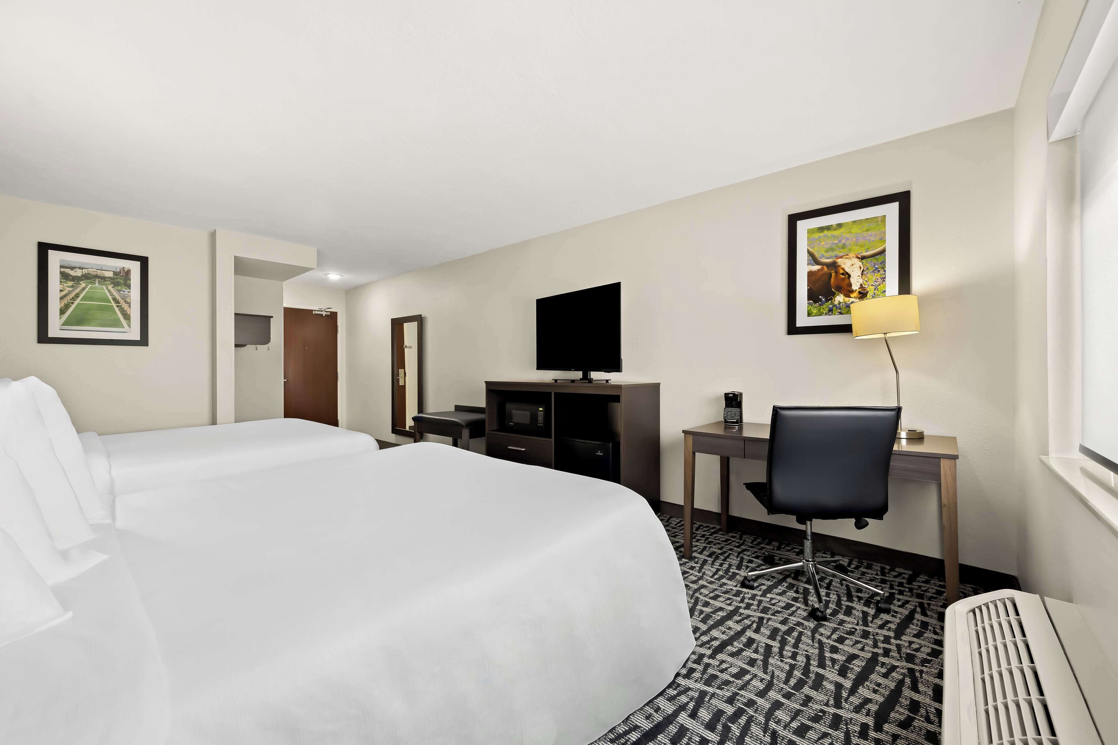 standard room, 2 queen beds, non smoking, refrigerator & microwave | 1 bedroom, desk, laptop workspace, iron/ironing board