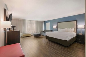 Desk, blackout drapes, iron/ironing board, rollaway beds