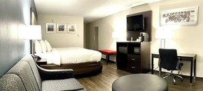 Habitación estándar, 1 cama King size y sofá cama, para no fumadores | Escritorio, cortinas blackout y tabla de planchar con plancha 