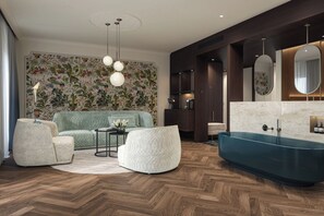 Suite (Serenity Spa) | Living area | 55-inch Smart TV with digital channels