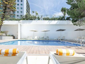 Seasonal outdoor pool, pool umbrellas, sun loungers