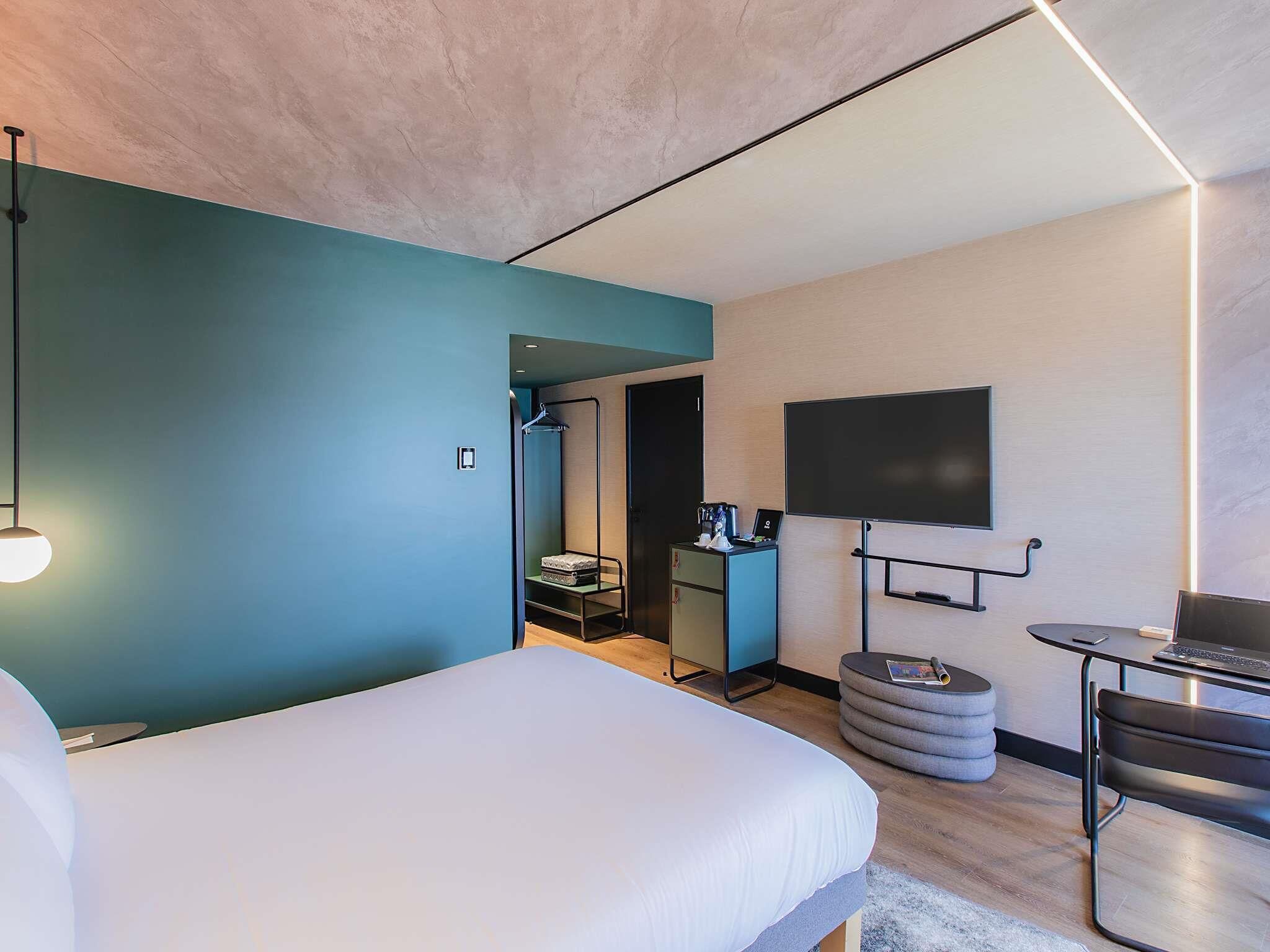 Chambre Exécutive, 1 grand lit et 1 canapé-lit | Literie hypoallergénique, minibar, coffres-forts dans les chambres