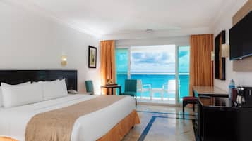 Kamar Deluks, 1 Tempat Tidur King, balkon, pemandangan samudra | Minibar, brankas, tirai kedap cahaya, dan kedap suara