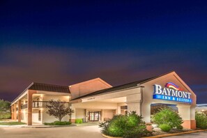 Welcome to Baymont Inn & Suites, featuring a modern entrance with a covered walkway.